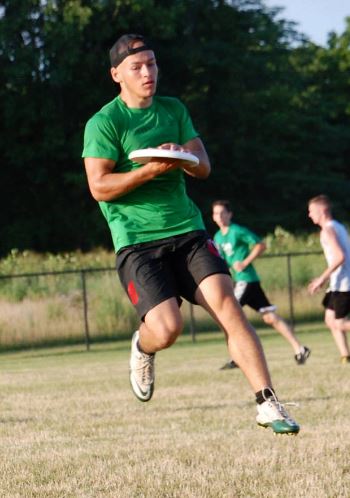 One of my first leagues (with unintentional cleat color coordination).